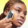 Woman using ZIIP HALO on her face