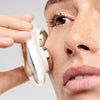 Woman using ZIIP HALO on their face