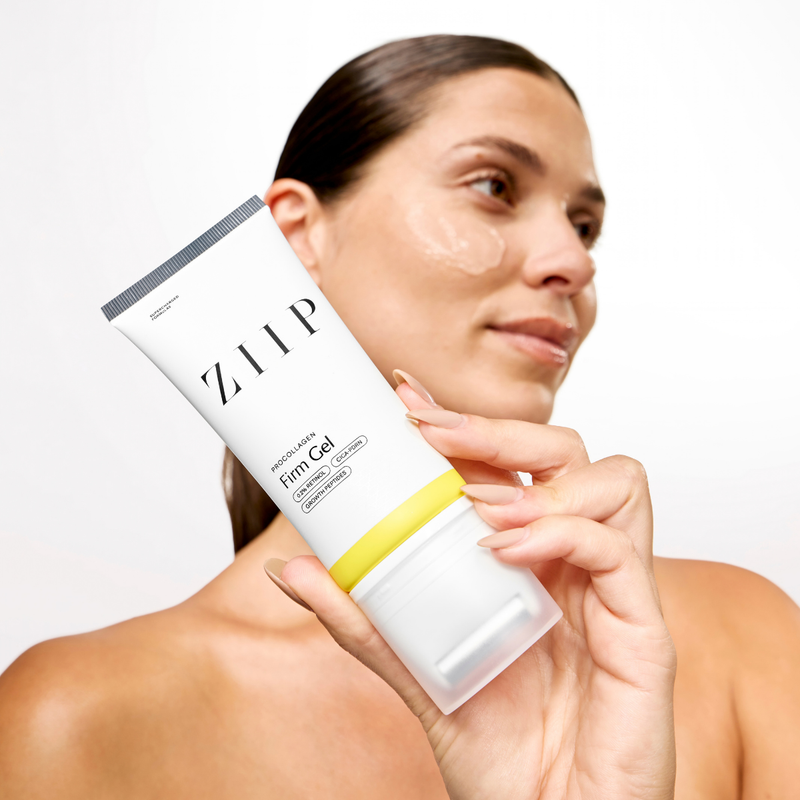 Woman holding the ZIIP Firm Gel bottle