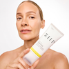 Woman holding the ZIIP Glow Gel